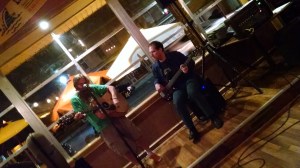 Nothing says rock & roll like baggy shorts and orange racing flats.